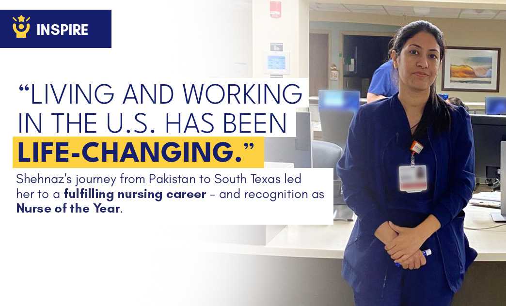 Shehnaz, a nurse in a blue uniform with a badge, stands confidently in a hospital setting with computers and artwork in the