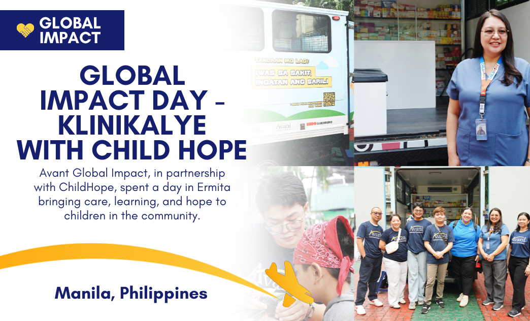 A group of volunteers in blue shirts gather in front of a truck, participating in a community outreach event in Manila,