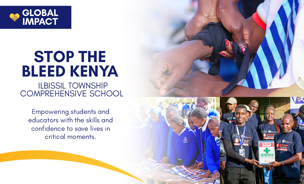 Hands applying a tourniquet on a child's arm during a first aid training session in Kenya.