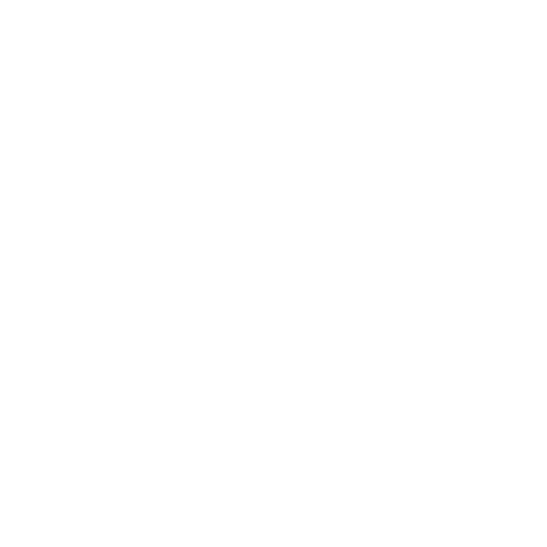 A person conducting an interview with a candidate seated across at a table in a professional setting.