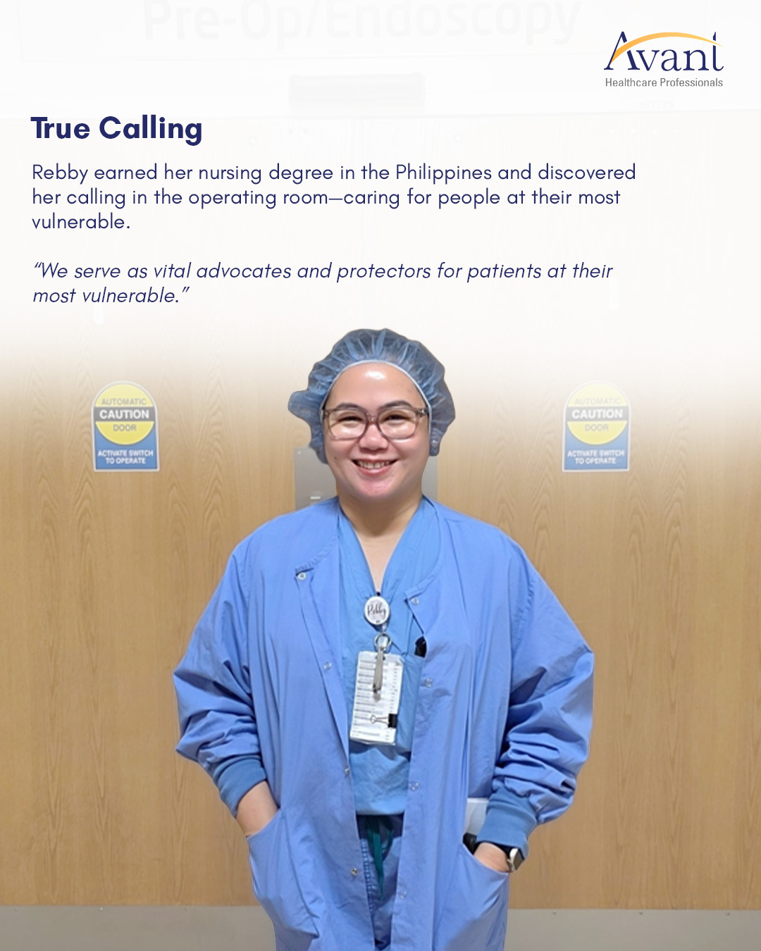 Rebby in blue scrubs and a hairnet, smiling in front of a wooden door with hospital signs.