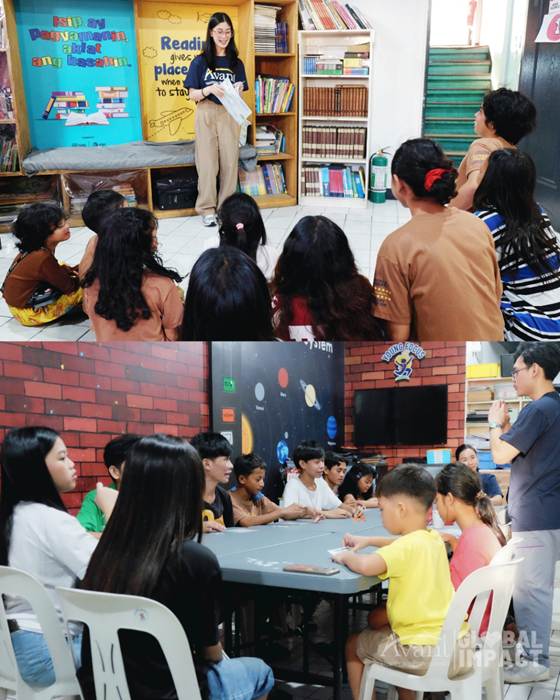 A woman reads to children in a classroom with bookshelves and colorful educational posters on the wall.