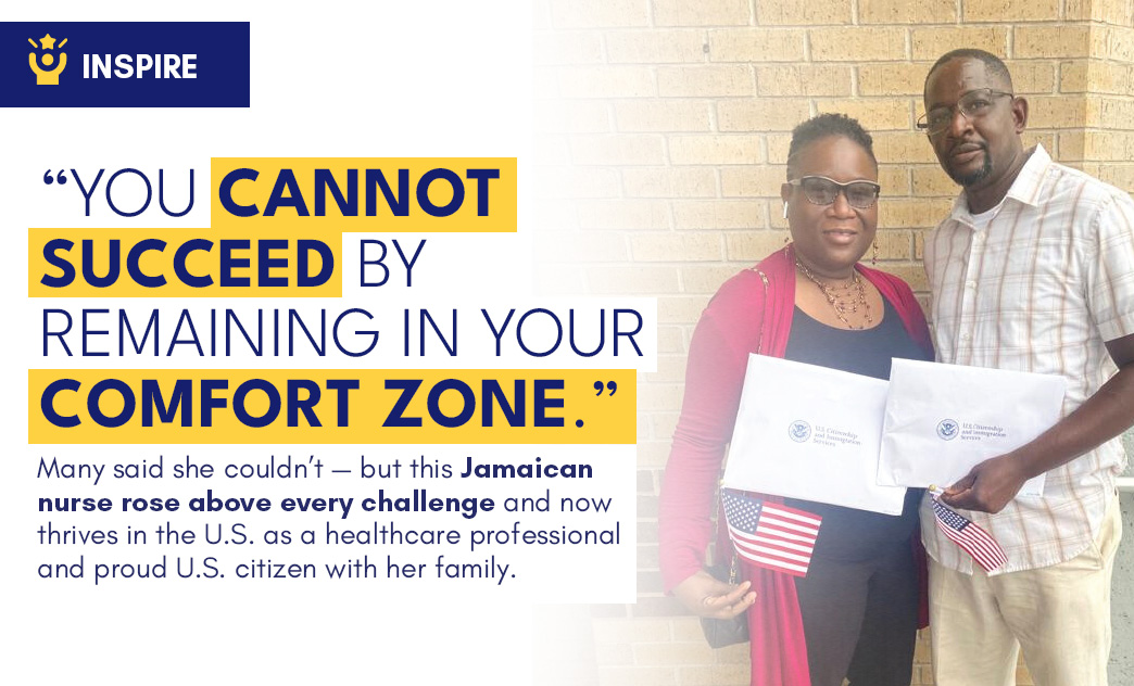 A Jamaican nurse and a man stand together holding certificates and small American flags outside a brick building.